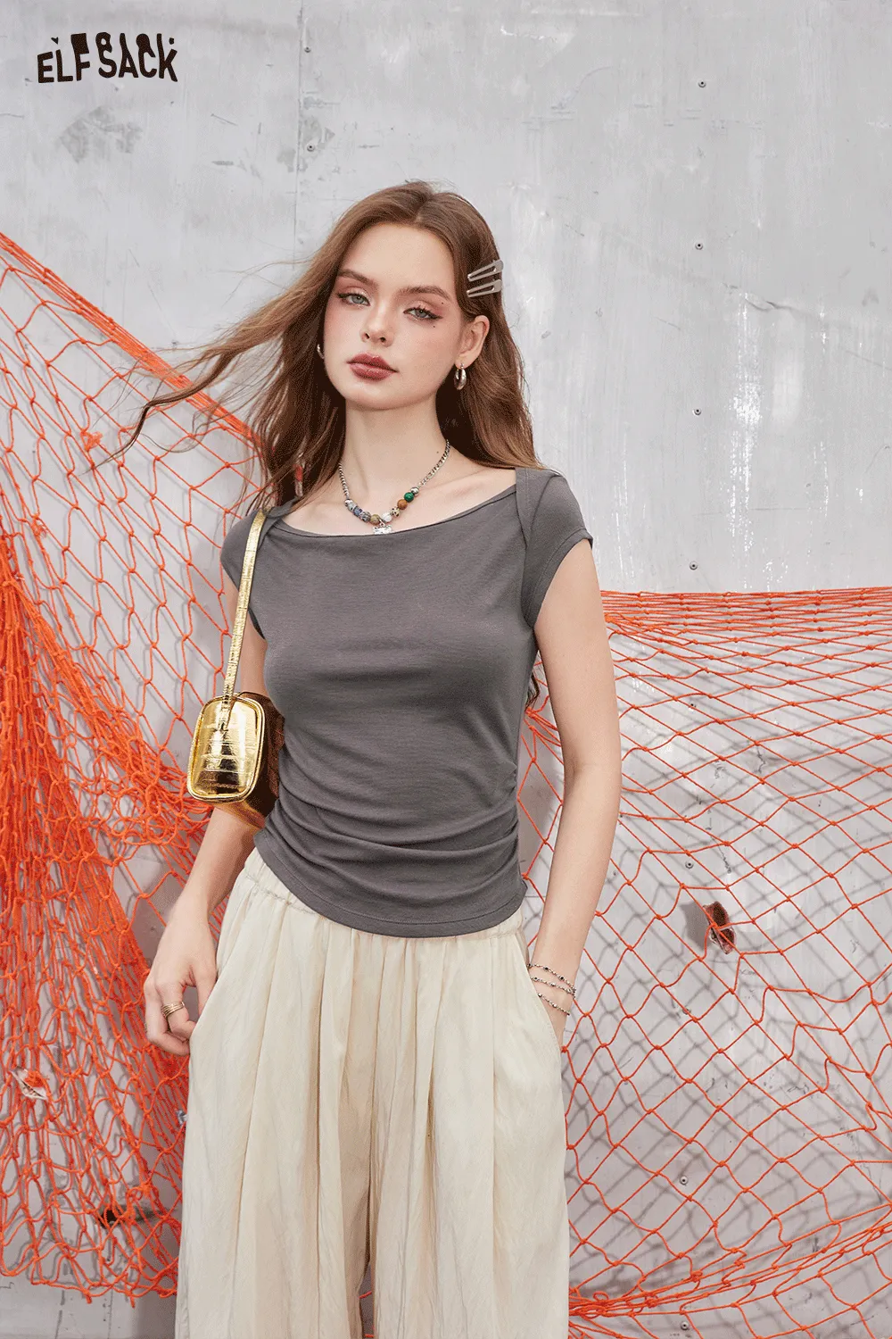 ELFSACK 2024 Summer New Arrivals Slim fit small fly sleeve t-shirt for women with a minimalist and breathable knitted top design